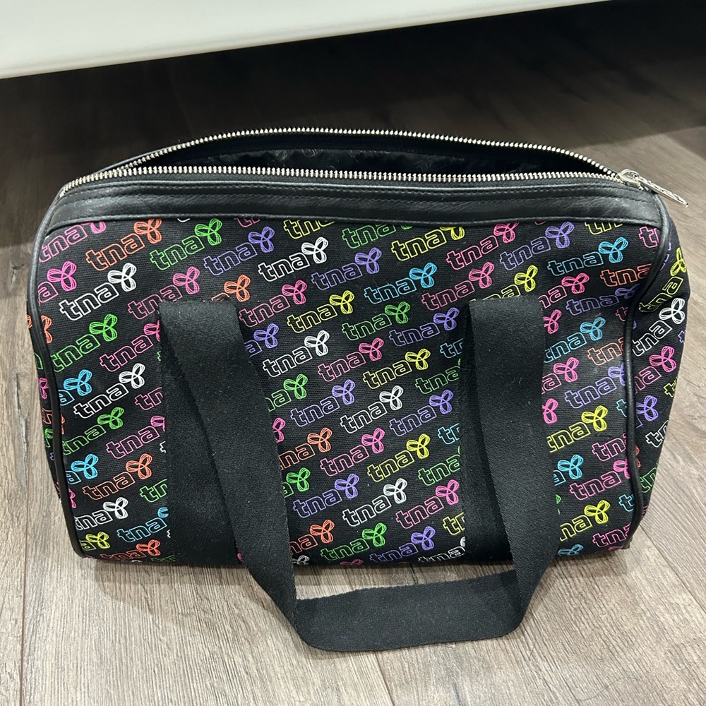 TNA logo Rainbow Duffelbag